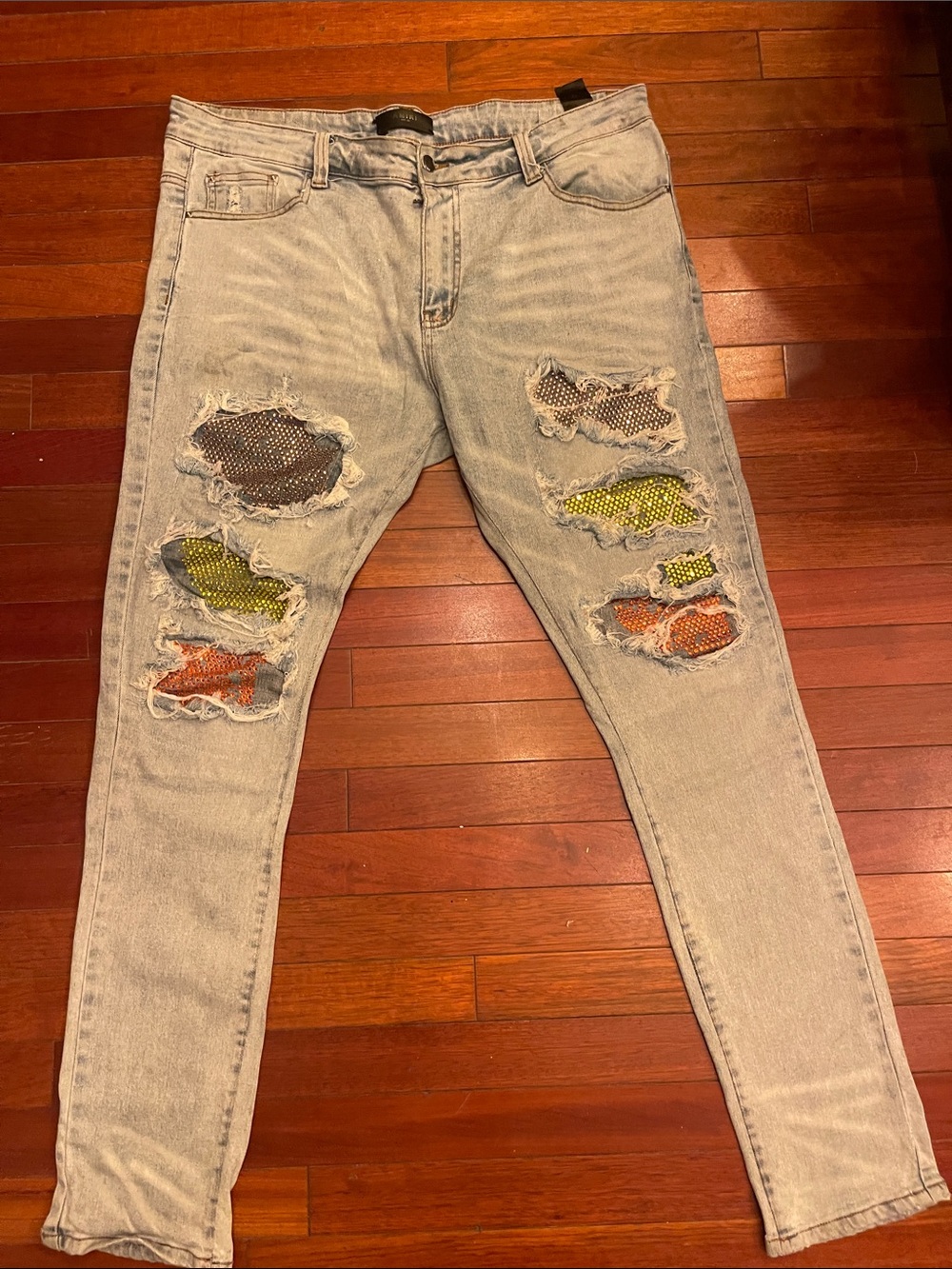 AMIRI Light Blue Distressed Skinny Jeans with Multi-Color Patchwork